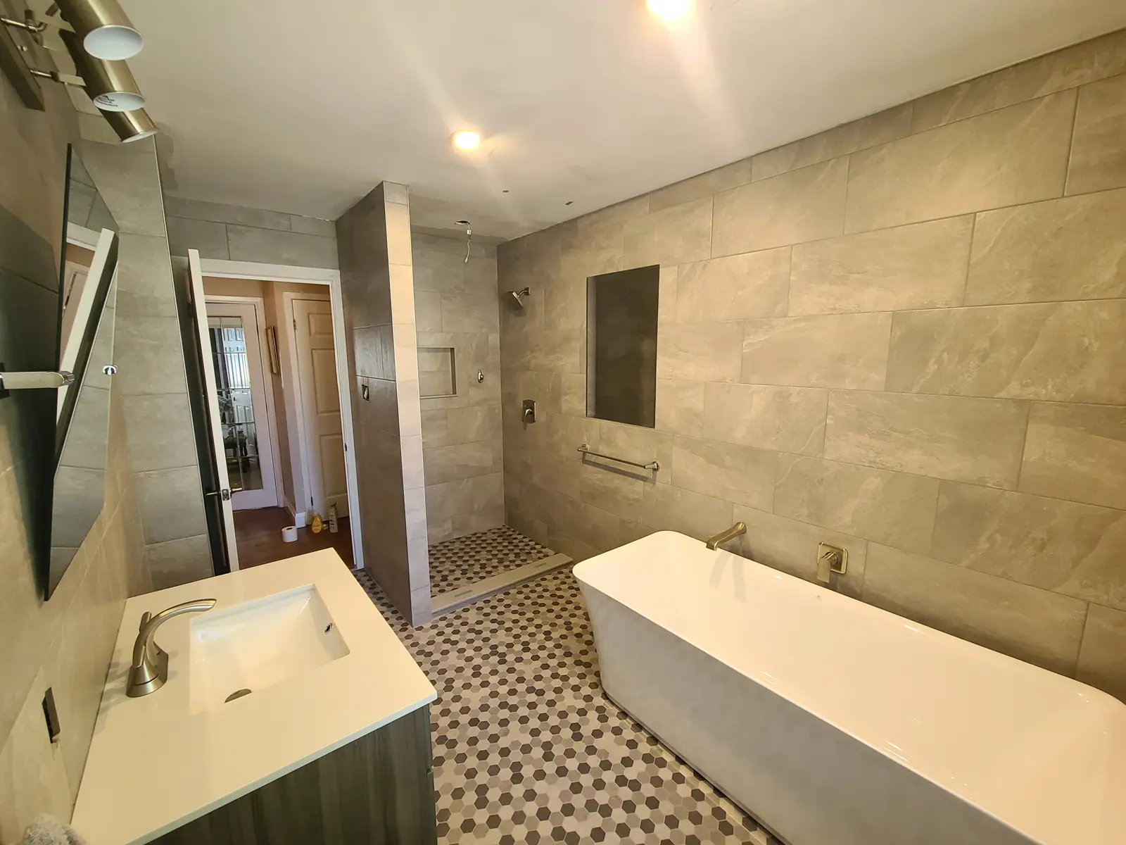 Modern bathroom with tub and walk-in shower