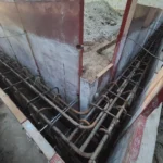 Concrete foundation with steel rebar framework construction
