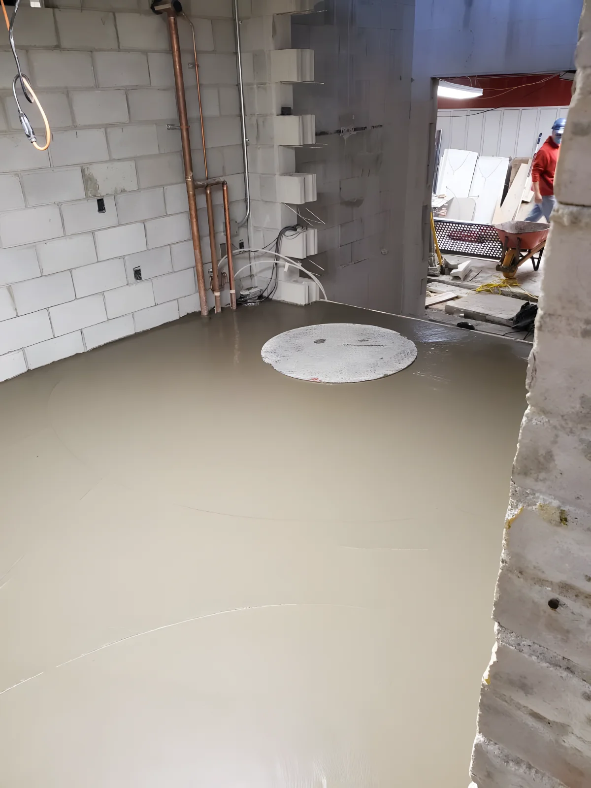 Freshly poured concrete floor in construction site.