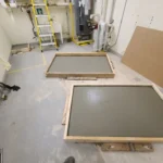 Fresh concrete slabs in utility room