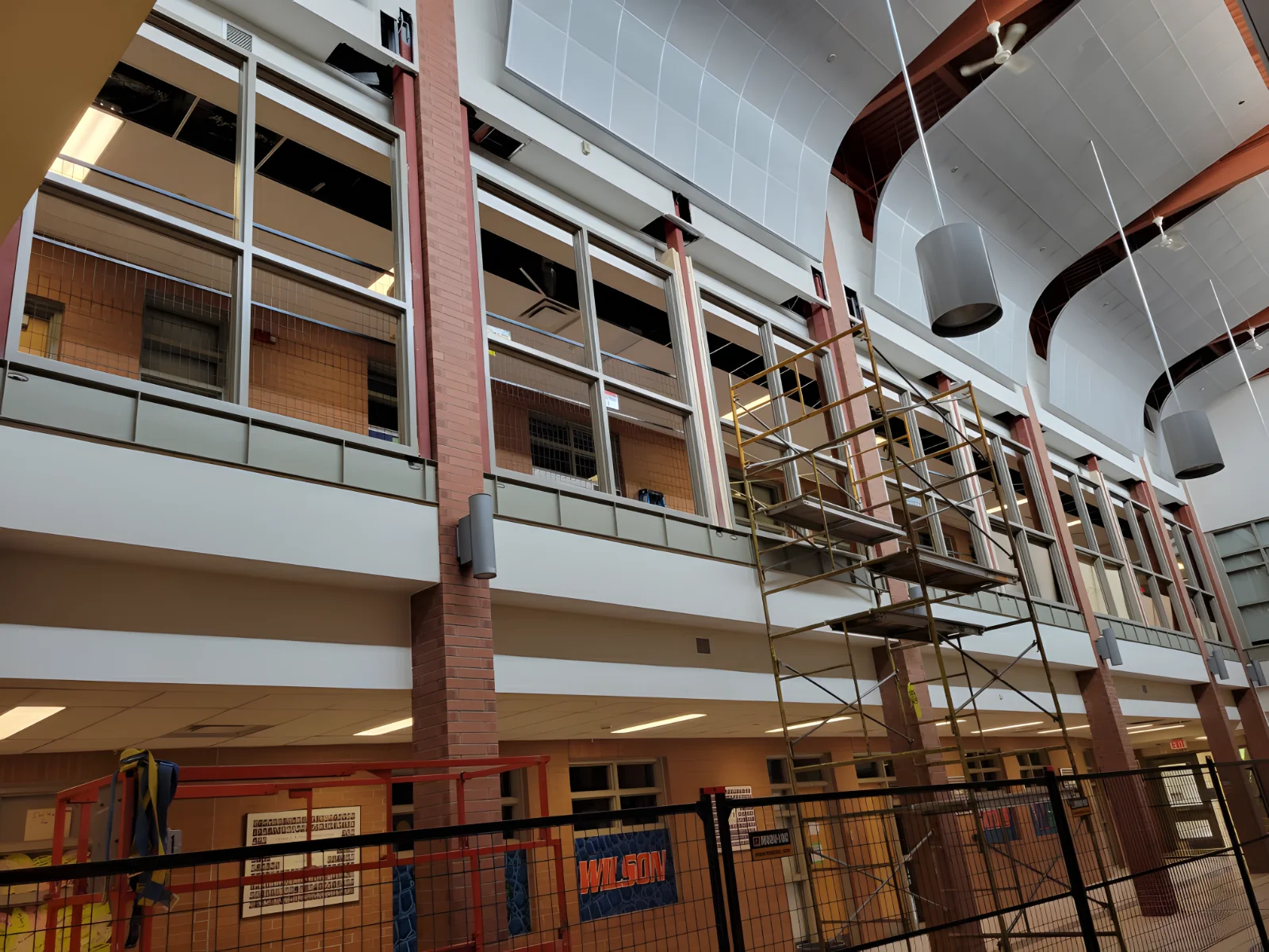 Scaffolding inside a large building under renovation.